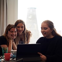 students looking at a computer