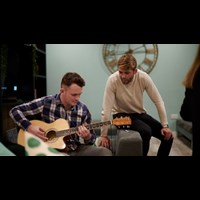 student playing guitar