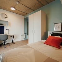 The Loom Gold Ensuite room with desk, bed and wardrobe in Dublin student accommodation